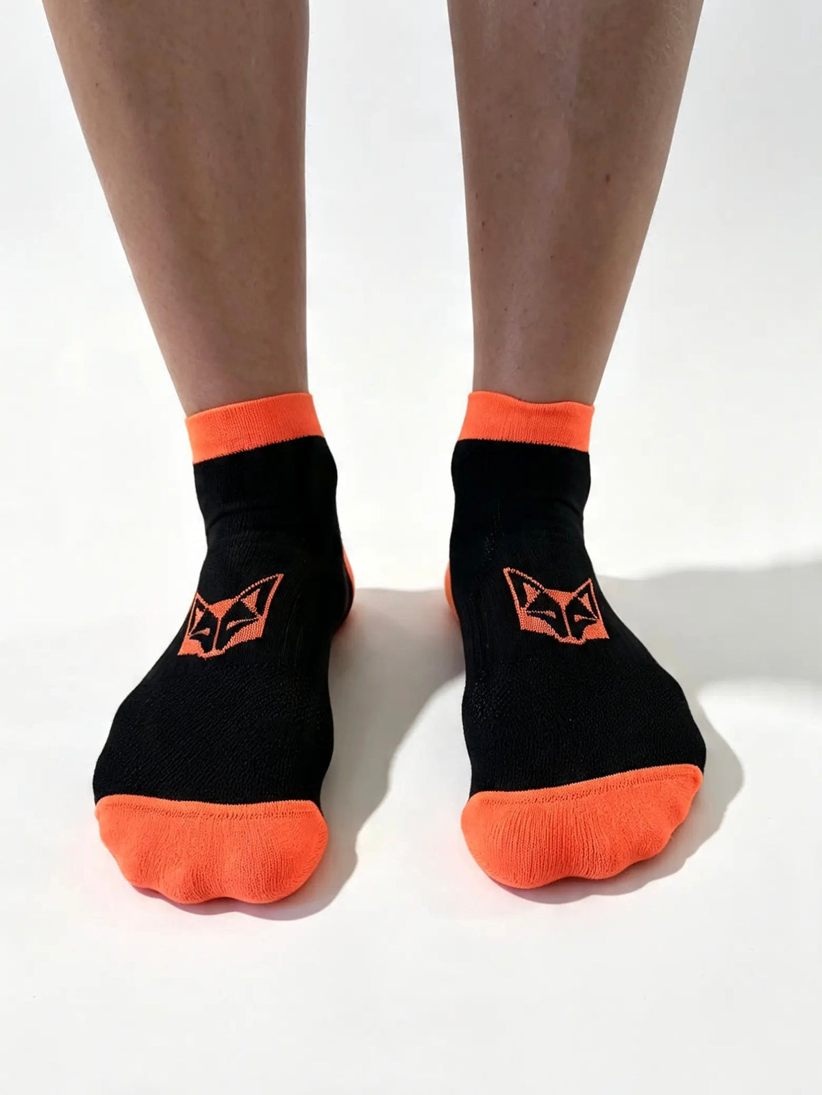 Löparstrumportrumpor Low cut Svart & Fluo Orange